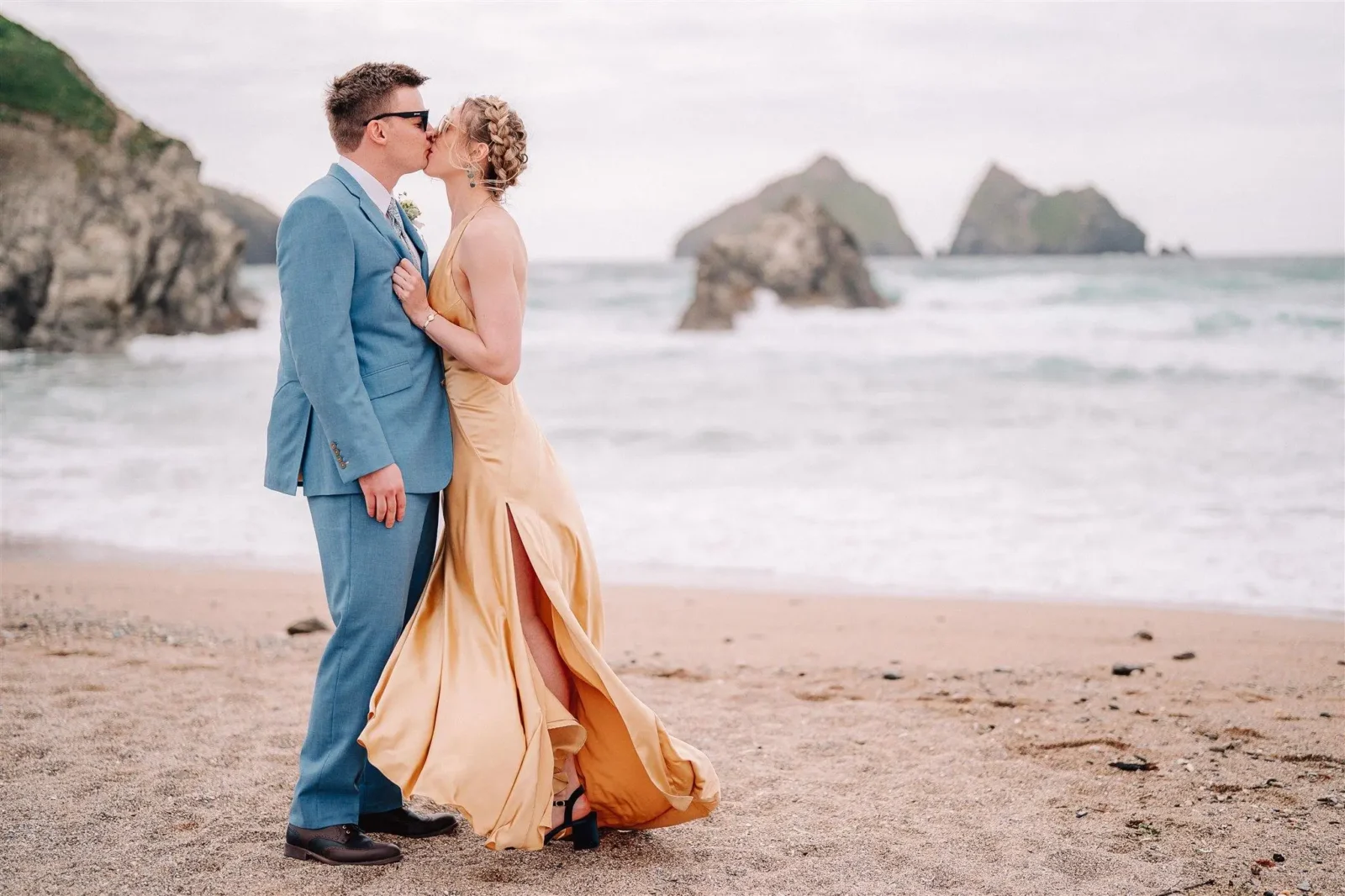 Ben and Chloe at Holywell Bay wide beach shot